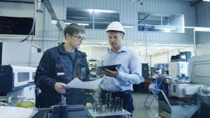 10_22_15_Engineer_and_Worker_on_Factory_Dolly_Shot